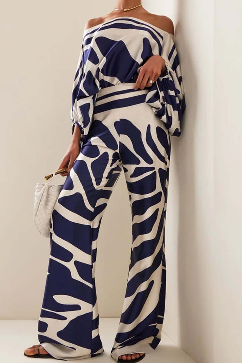 Women's elegant printed off-shoulder long sleeve two-piece skirt set.