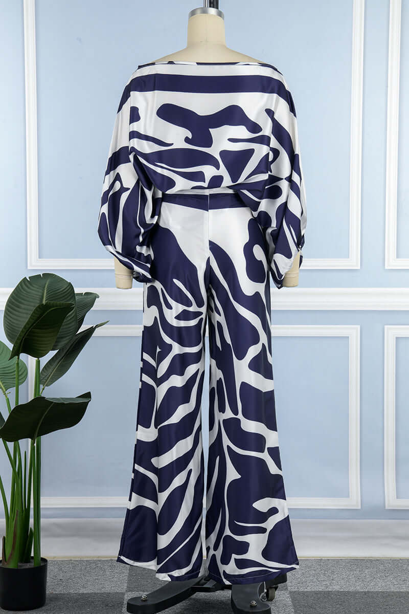 Chic women's printed off-shoulder long sleeve top and matching skirt.