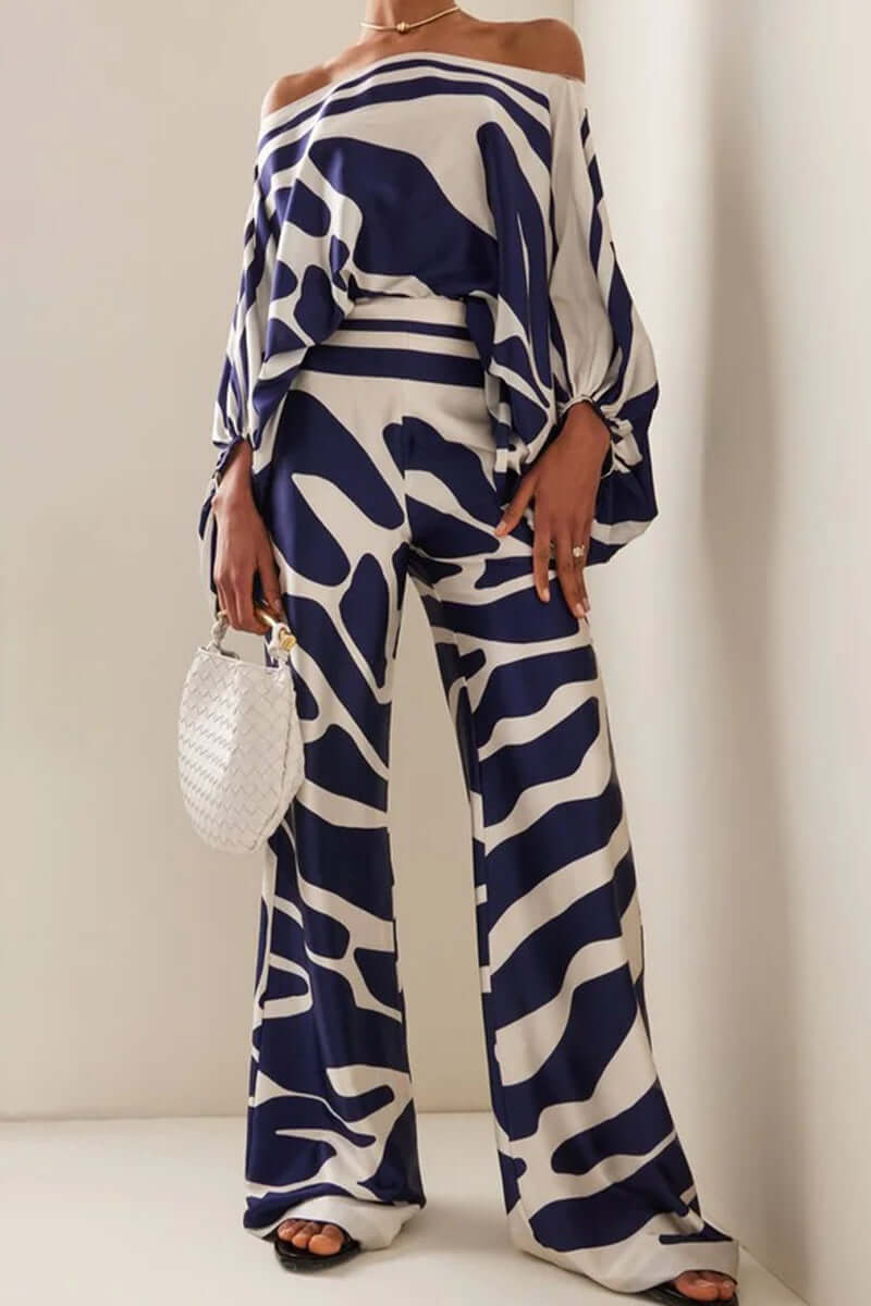 Stylish women's off-shoulder long sleeve printed two-piece set for winter fashion.