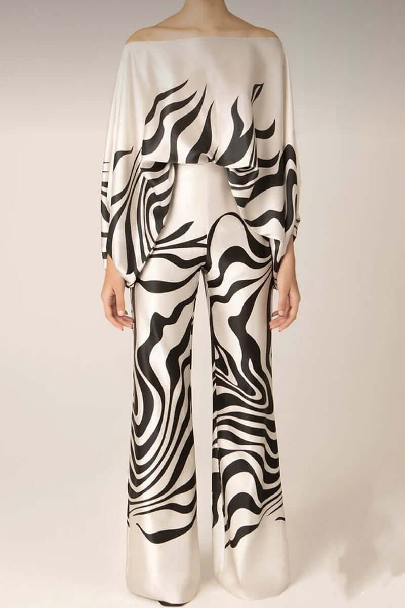 Versatile women's printed off-shoulder long sleeve top & skirt set.