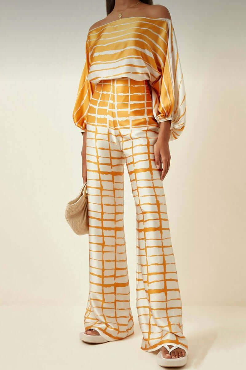 Chic women's casual printed off-shoulder long sleeve two-piece skirt set.