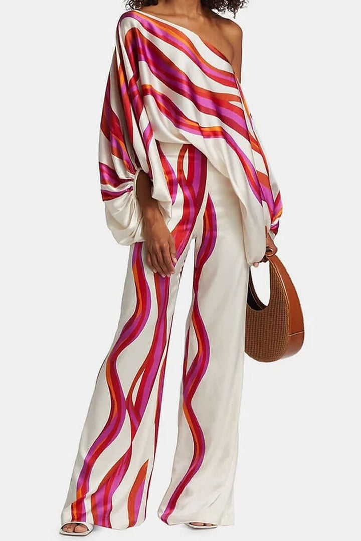 Women's two-piece off-shoulder long sleeve set with a beautiful print.