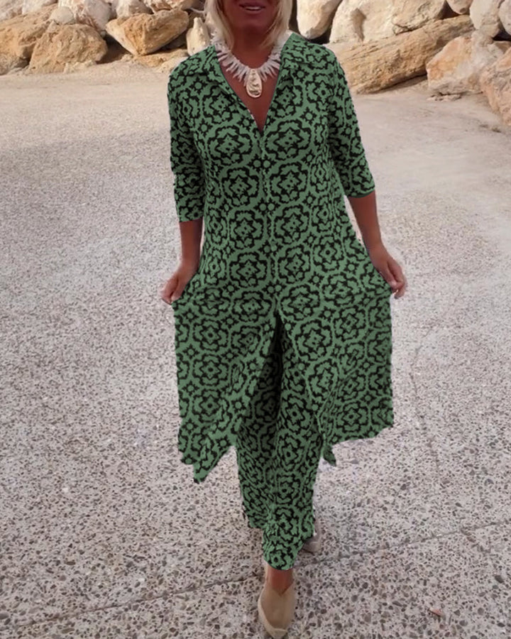 Fashionable women's summer set: elegant printed blouse and matching comfortable pants.