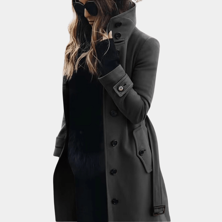 Warm women's long quilted trench coat, ideal for classic fall fashion, office wear or casual chic style.
