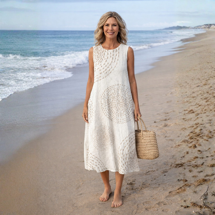 Casual retro midi dress for women with pockets. Perfect sleeveless spring/summer outfit or everyday wear, elegant print.