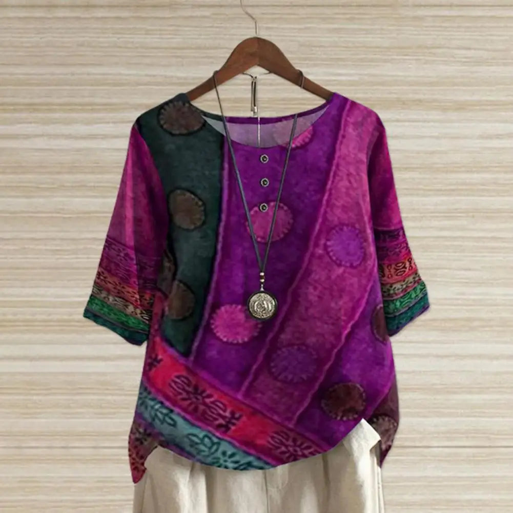 Comfortable women's round-neck top, versatile for layering or casual everyday wear. Available in plus sizes.