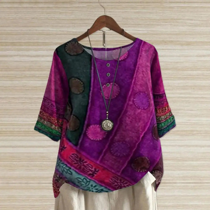 Comfortable women's round-neck top, versatile for layering or casual everyday wear. Available in plus sizes.