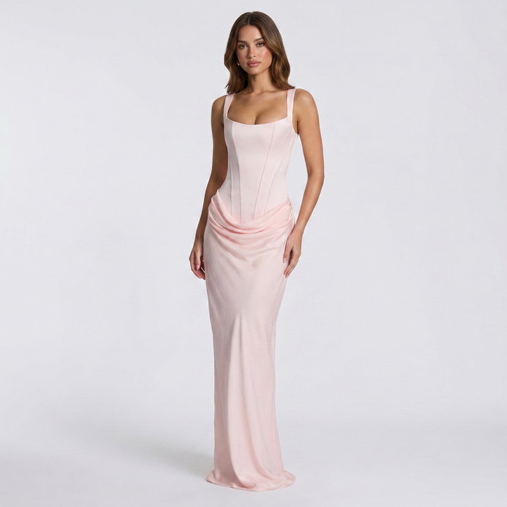 Flowing women's ruched scoop neck maxi dress, an elegant sleeveless design perfect as a versatile formal or casual dress.