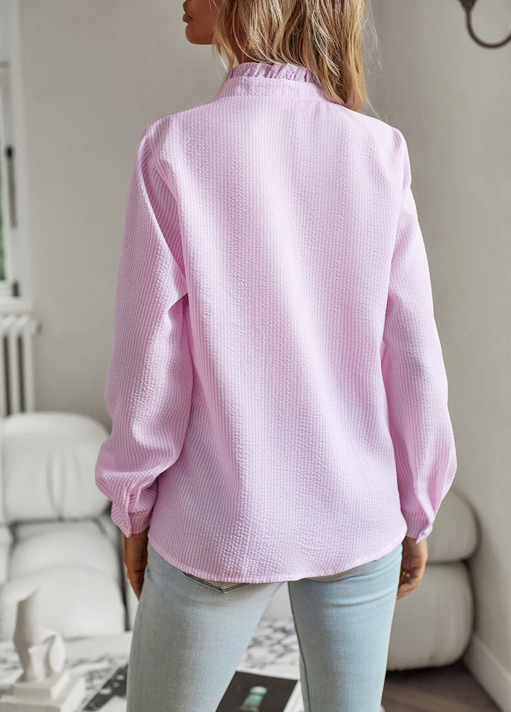 Versatile women's elegant ruffle top, a long sleeve shirt perfect for both casual and formal styles.