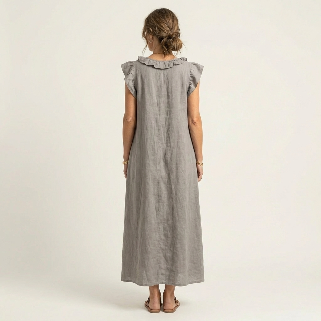 Flowing long maxi dress with chic ruffles & V-neck, ideal for casual wear.