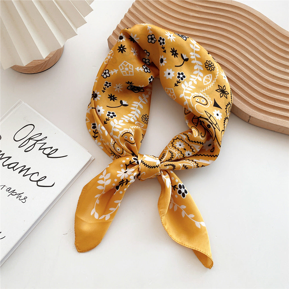Lightweight women's satin leopard print summer scarf, a chic versatile accessory.