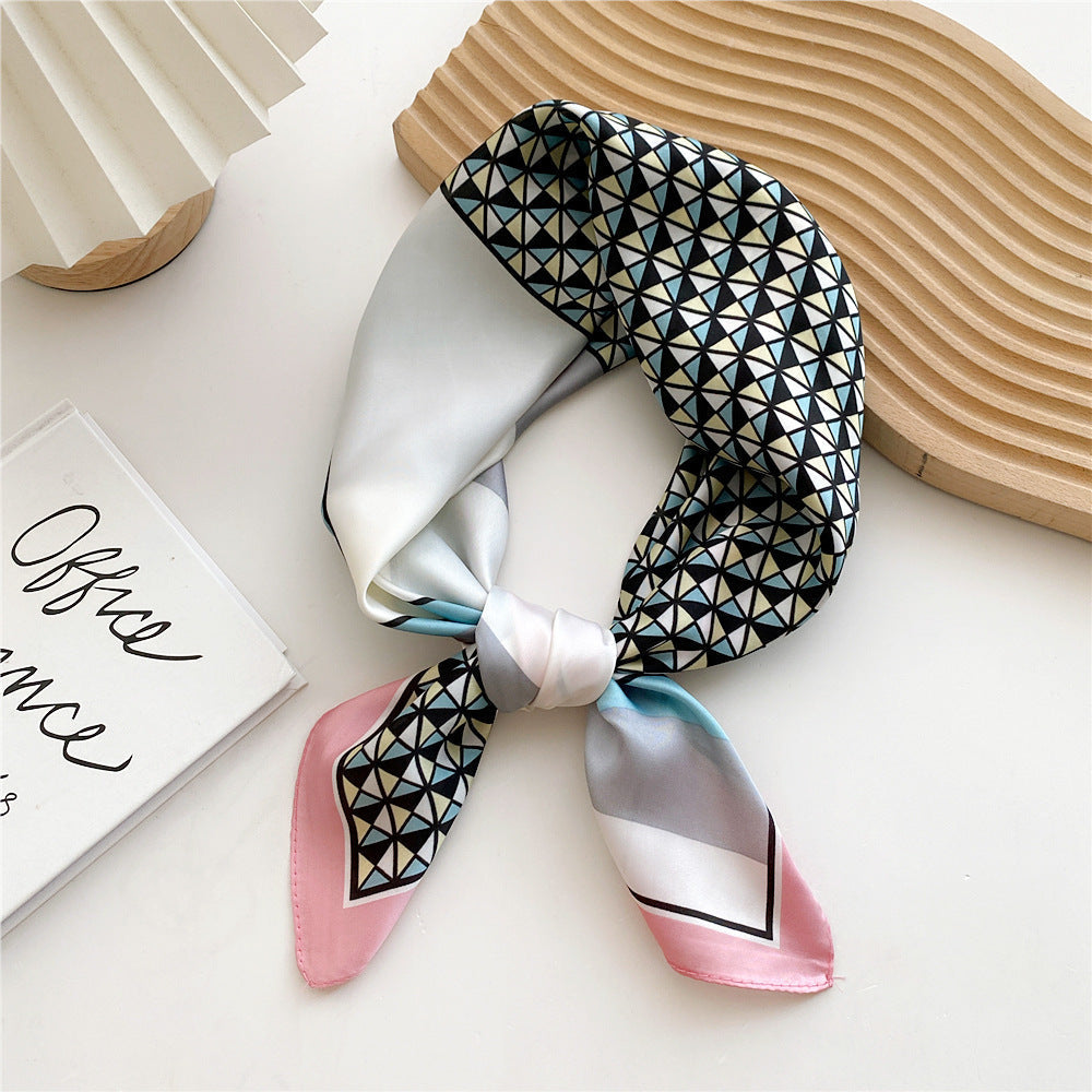 Stylish women's satin leopard print hair accessory, perfect as a chic headwrap.