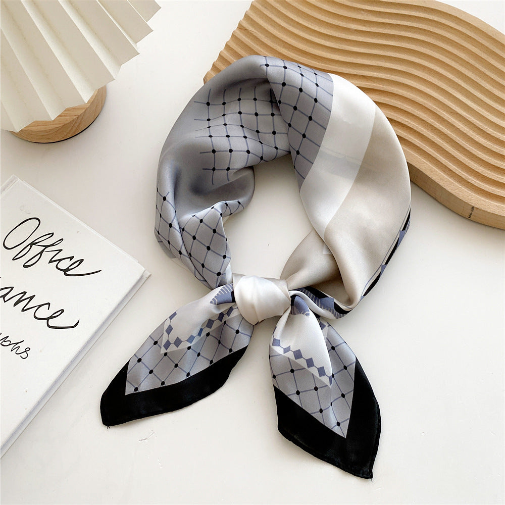 Elegant women's printed satin leopard scarf, versatile for any outfit.