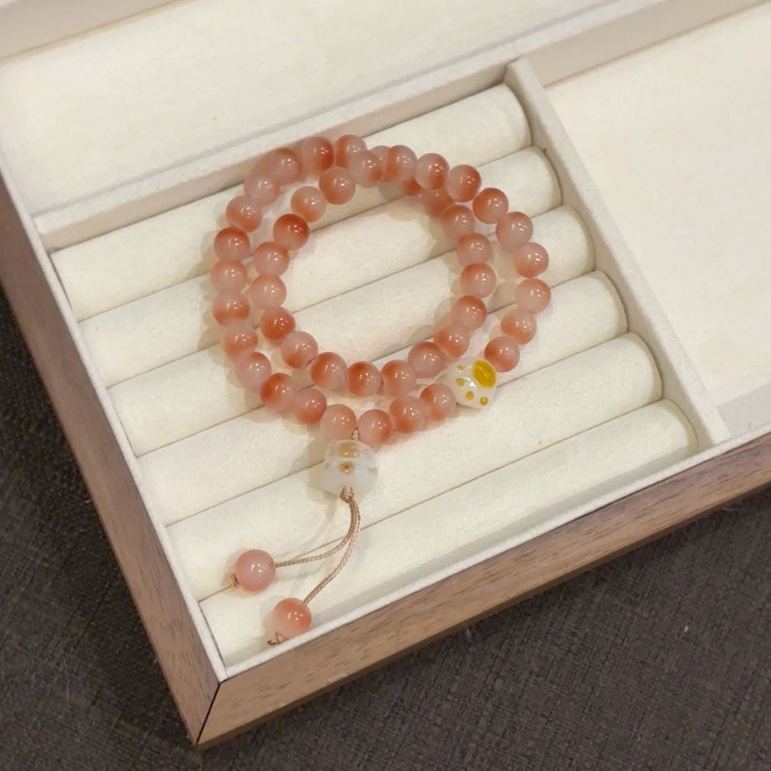 Adjustable women's semi-precious stone bracelet, layered pink & green beads, elegant friendship jewelry.