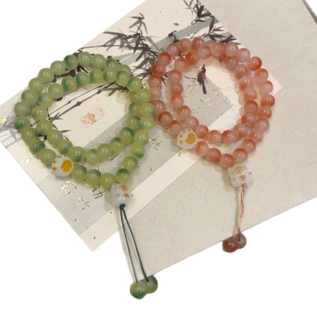 Elegant women's semi-precious stone bracelet, adjustable friendship design with pink & green beads.