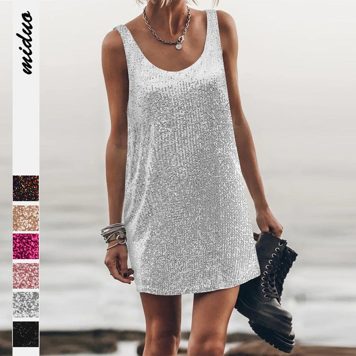 Women's elegant sequin mini dress, perfect for parties & special occasions.
