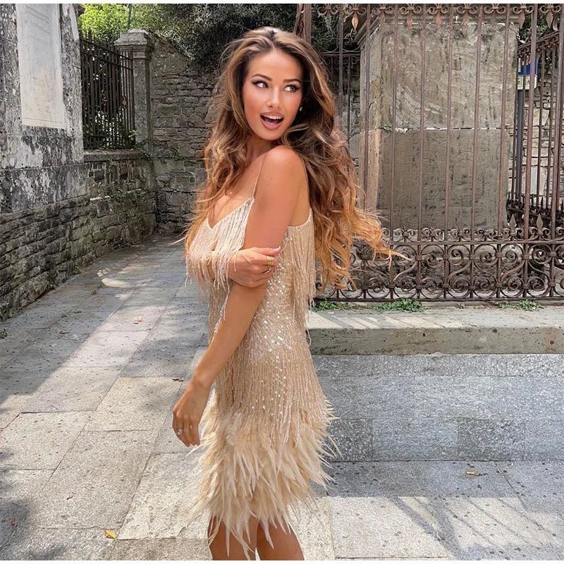 Chic women's sequin spaghetti strap party dress, a fitted cocktail and evening gown.