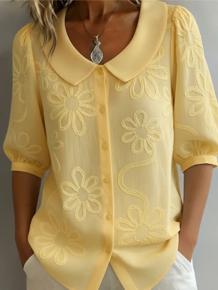 Women's elegant short sleeve floral embroidered blouse with round neck. Perfect for spring/summer casual wear.