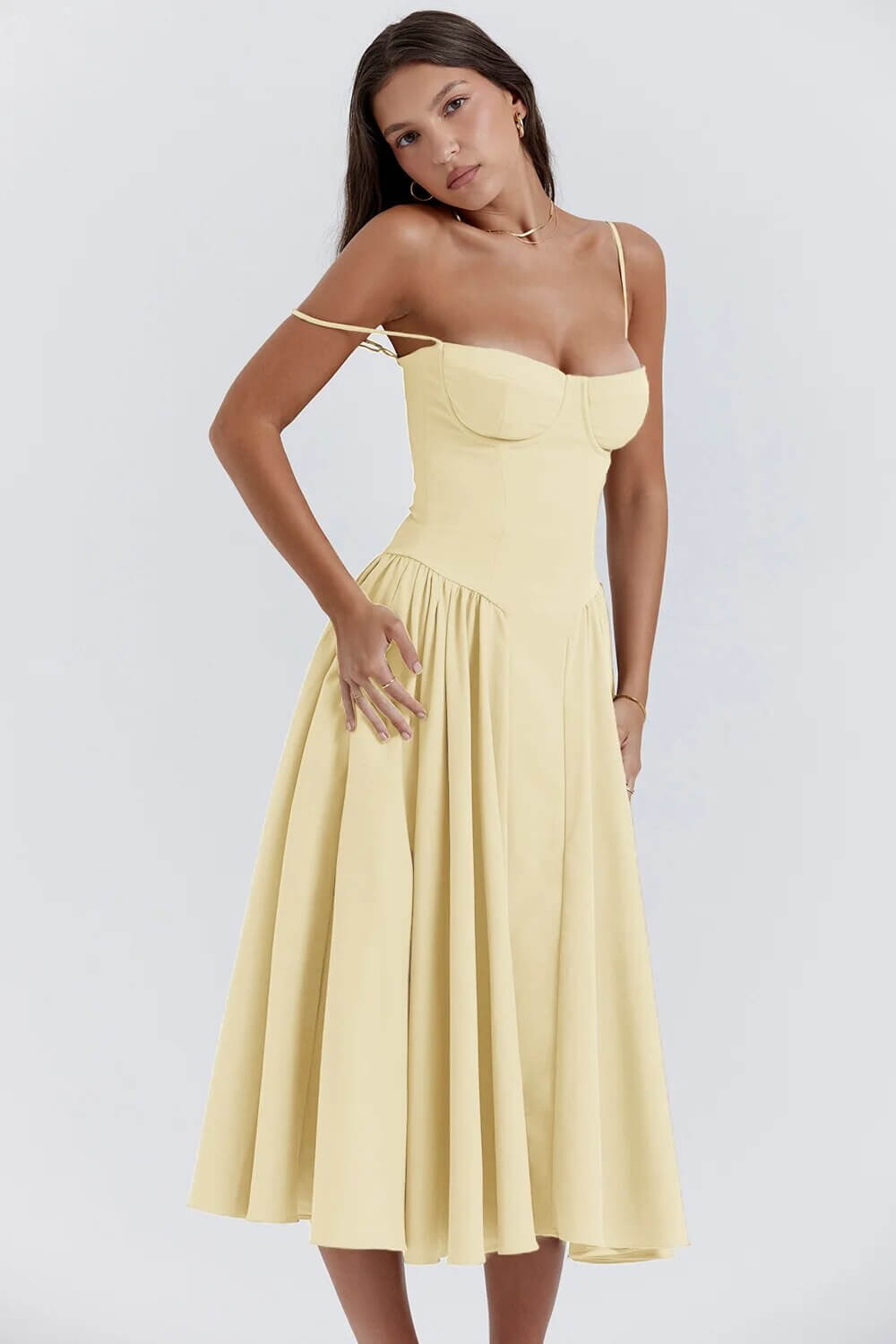 Women's party-ready midi dress. Sleeveless, with a fitted corset design for an elegant look.