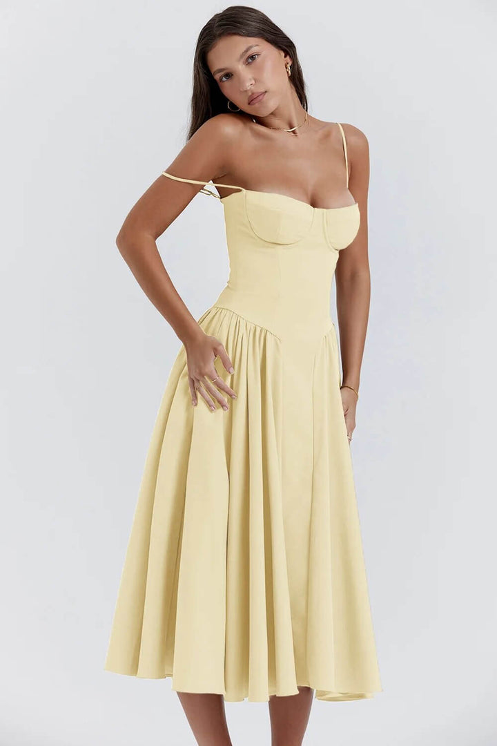 Women's party-ready midi dress. Sleeveless, with a fitted corset design for an elegant look.