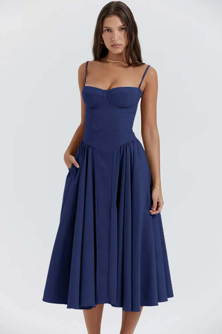 Chic women's summer midi dress, sleeveless with a flattering corset fit. Versatile party wear.