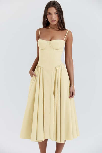 Women's flattering midi dress, sleeveless with a corset top. Ideal for chic summer parties.