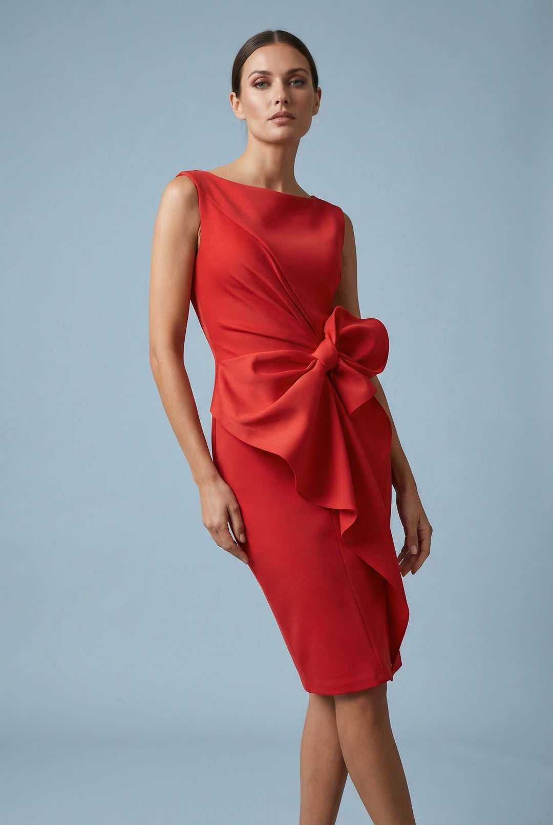 Formal women's sleeveless midi dress, an elegant cocktail or party dress with a chic bow waist detail.
