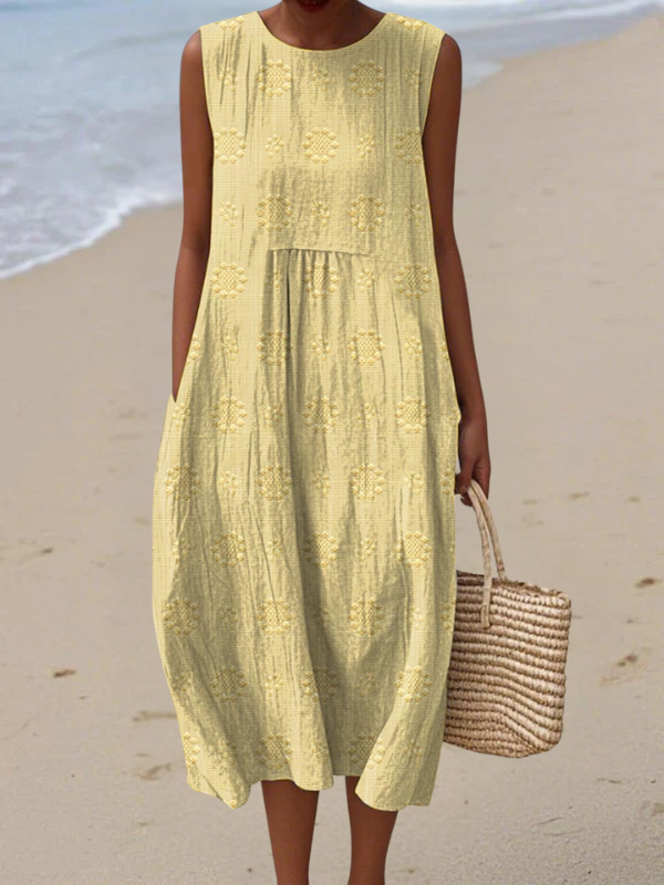 Effortless women's sleeveless midi dress, beautifully embroidered for an elegant yet casual summer style.