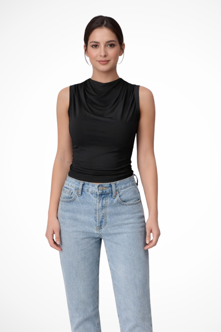 Chic women's sleeveless peplum top, elegant draped neck design. Ideal for workwear or casual fashion.