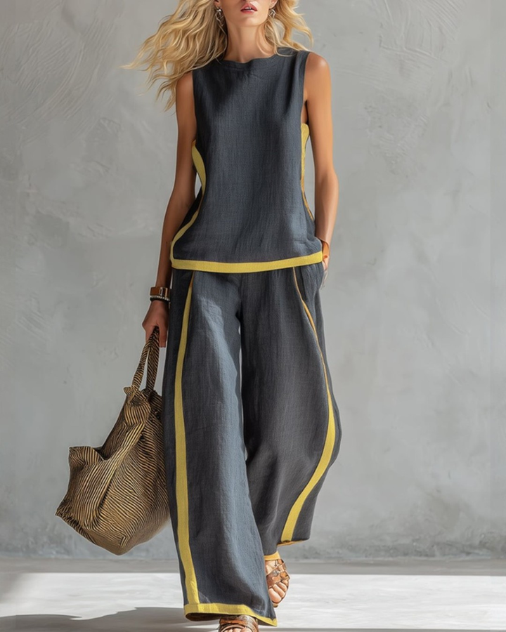 Women's elegant sleeveless top & wide leg trouser set, perfect for stylish comfort.