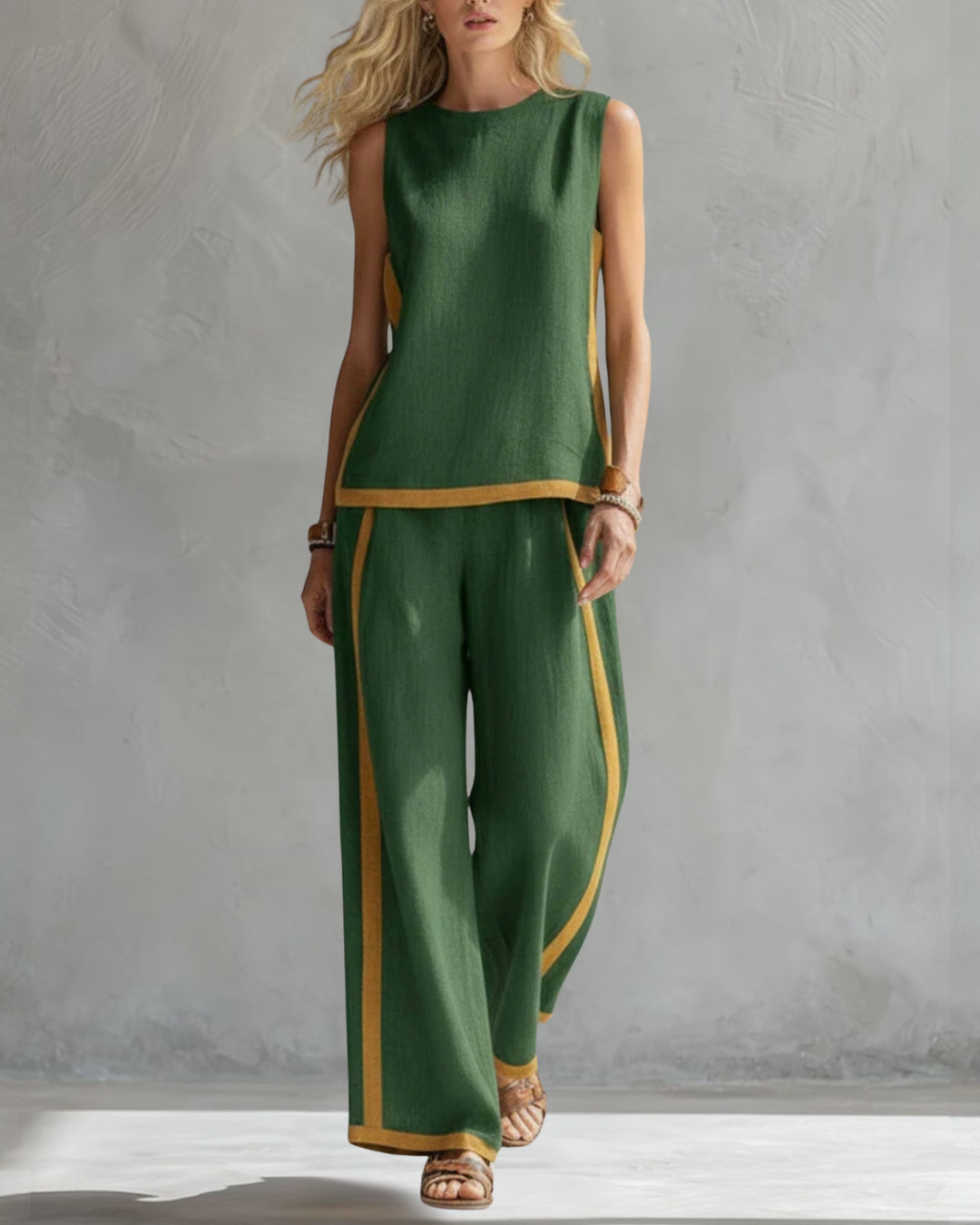 Chic women's sleeveless top and flattering wide-leg trousers, a complete elegant outfit set.