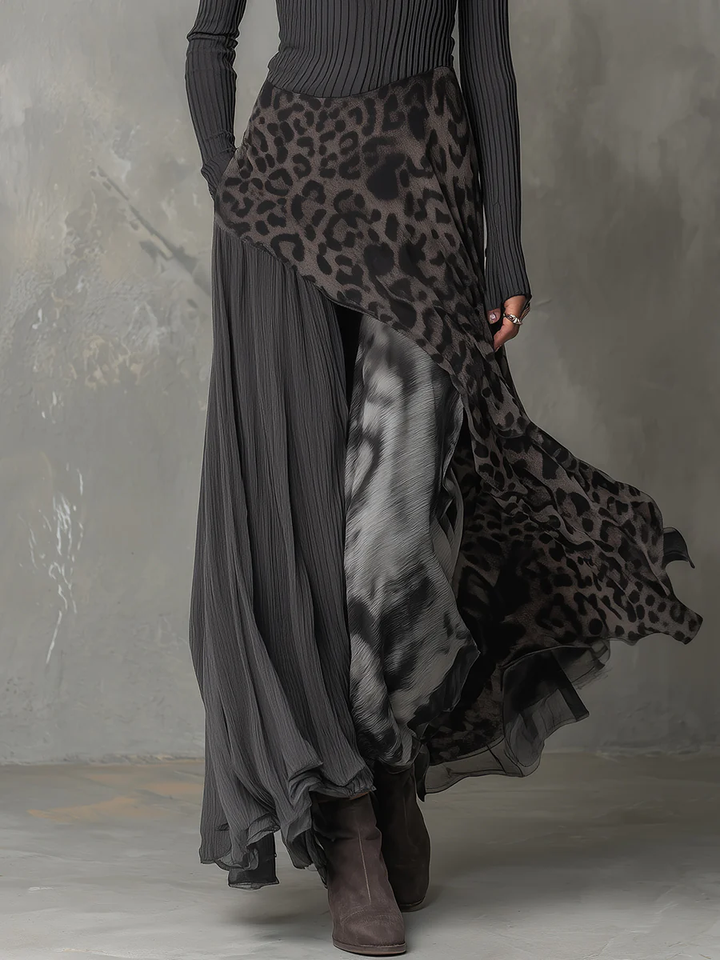 Stylish women's maxi dress in a slim fit, featuring an irregular hem. Elegant and comfortable for any occasion.