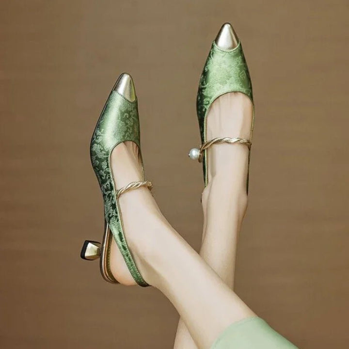 Stylish women's party heels: pointed-toe slingback sandals with pearl strap & comfortable kitten heel for evening wear.