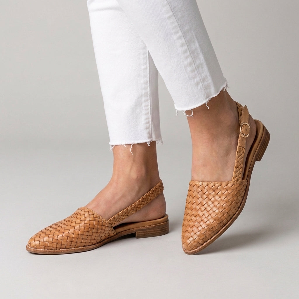Chic women's slip-on pointed toe flats. Comfortable and stylish everyday footwear for a polished, effortless look.