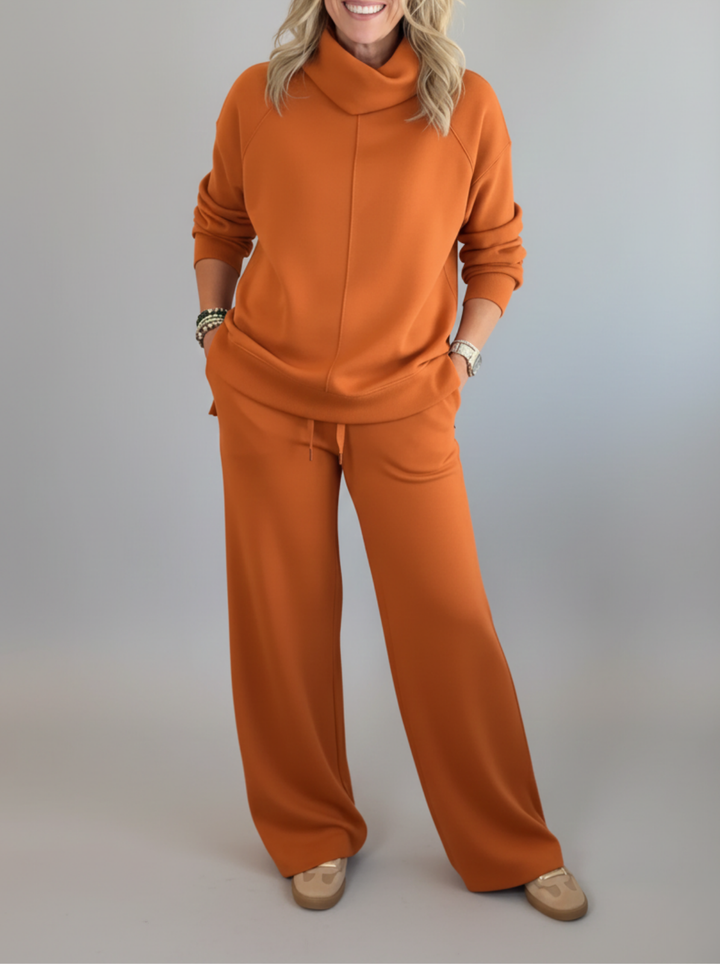 Women's versatile elegant lounge set, two-piece soft fabric apparel, comfortable pullover & pants for daily wear.