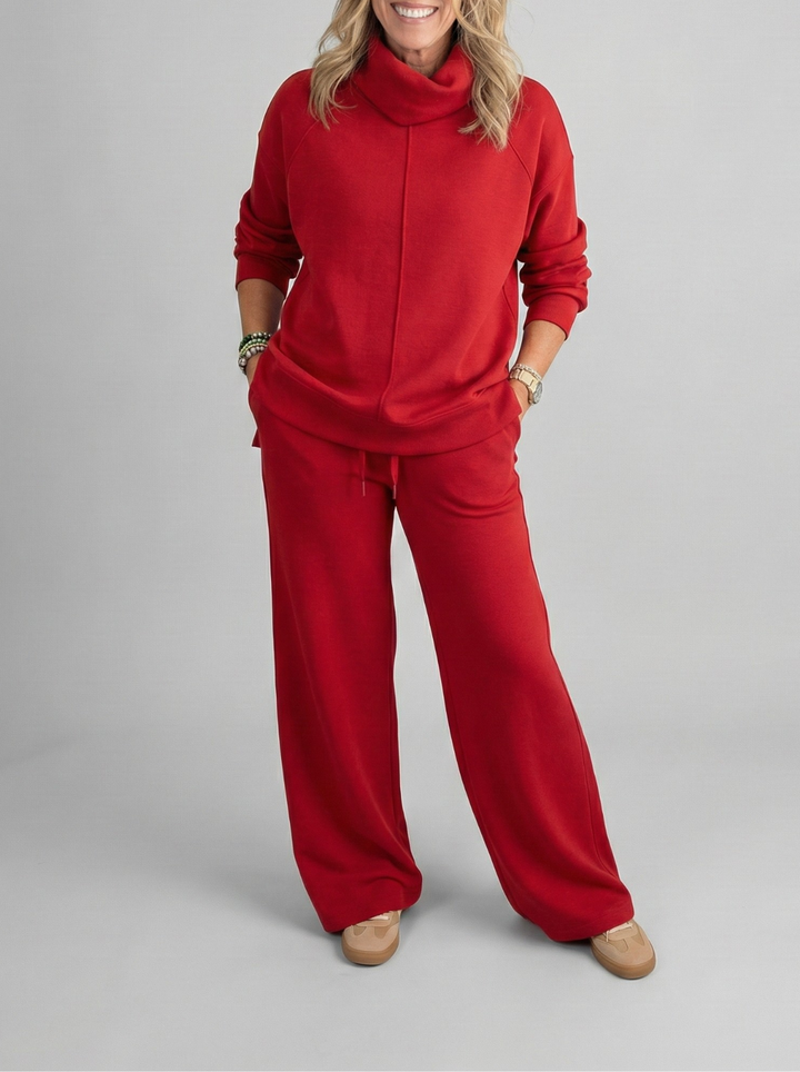 Soft fabric women's lounge set, two-piece pullover & pants for relaxed fit, comfortable and elegant everyday wear.