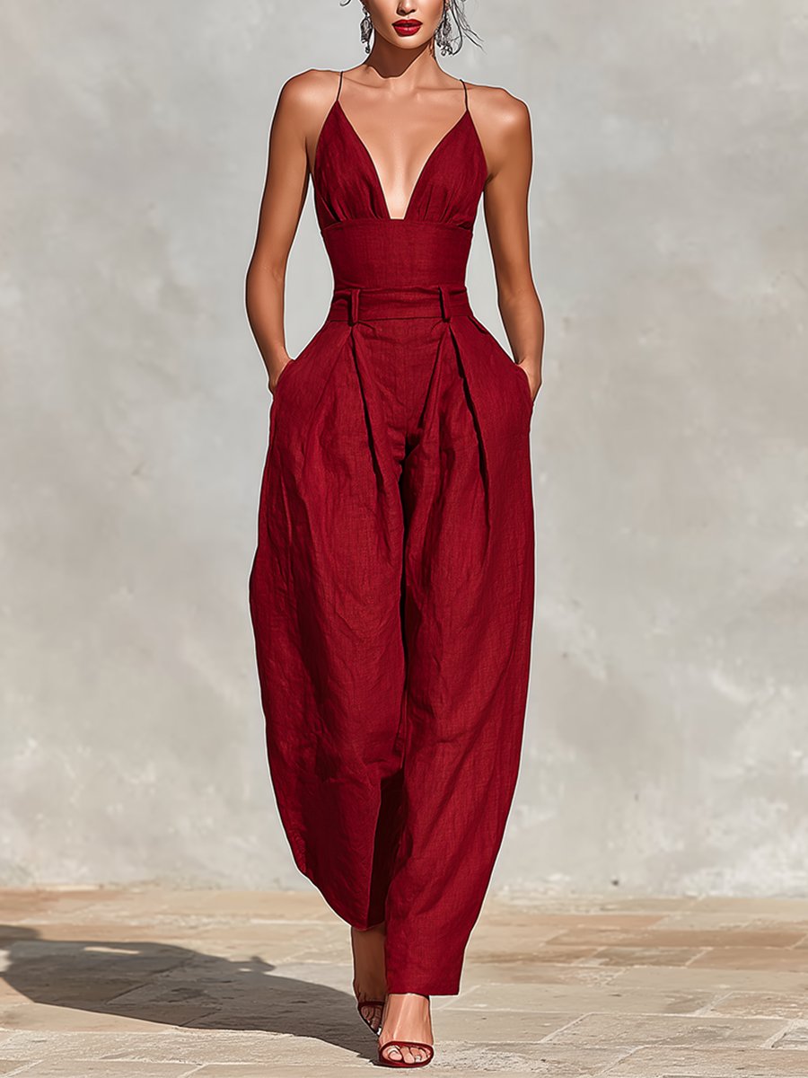Women's elegant spaghetti strap high-waist wide-leg jumpsuit. Perfect formal wear for parties.