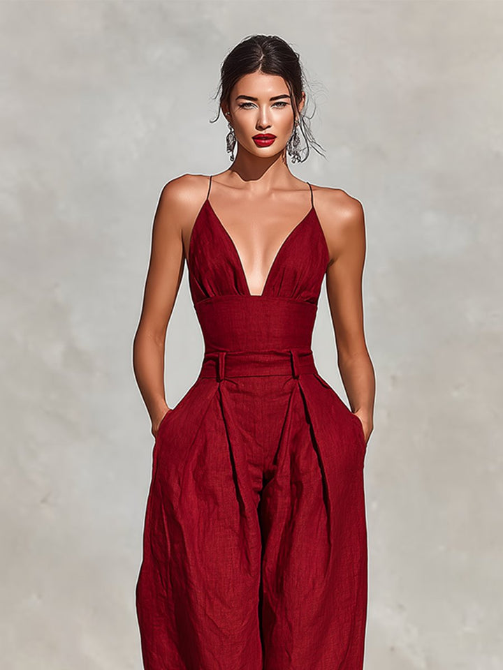 Elegant women's pleated wide-leg jumpsuit, spaghetti strap & high-waist. Versatile for wedding guests.