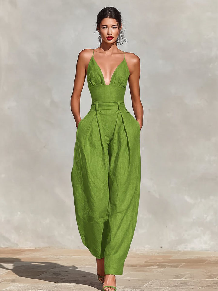 Stylish women's high-waist wide-leg jumpsuit, spaghetti strap & V-neck. Elegant and comfortable party attire.