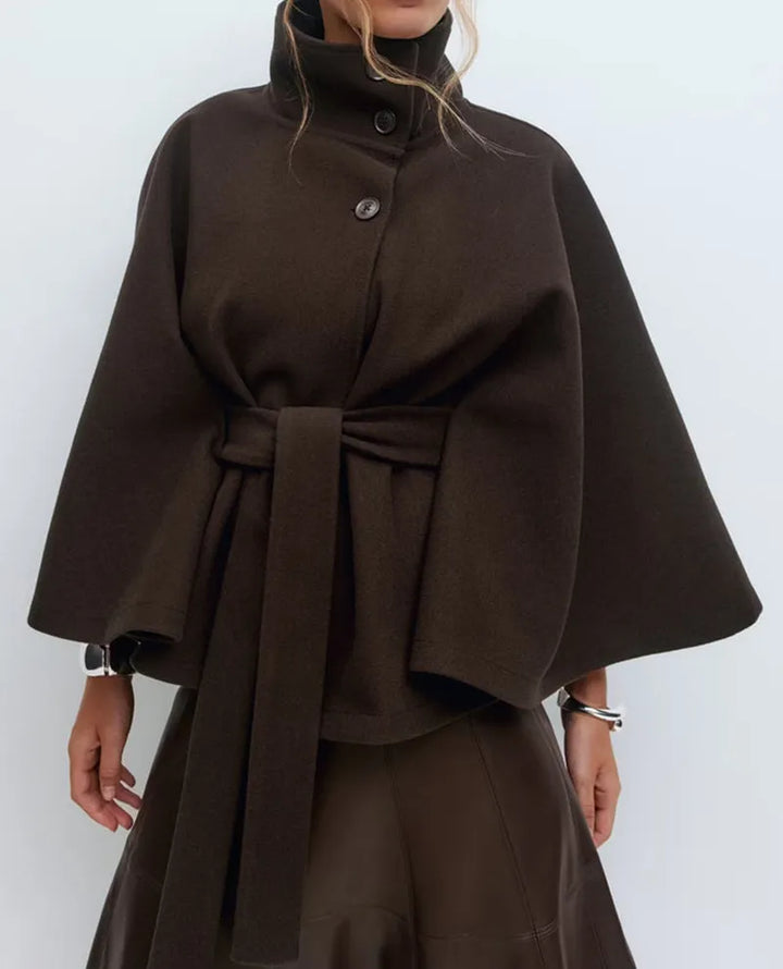 Women's elegant high-neck belted spring cape coat. Stylish and chic outerwear for women's fashion.