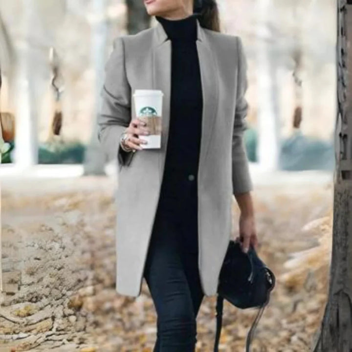 Women's elegant stand-collar winter coat. Chic, warm outerwear for cold weather with structured button front.
