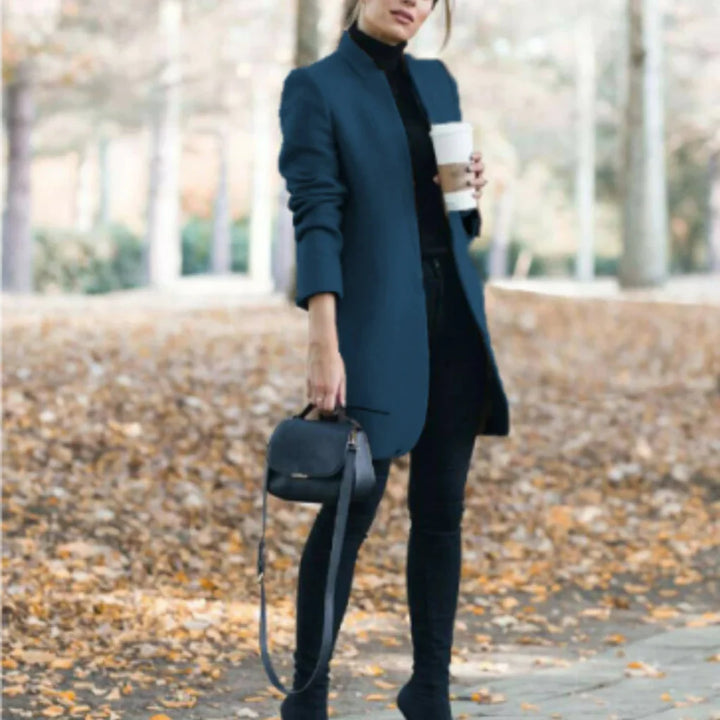 Stylish women's long stand-collar winter coat. Elegant, warm outerwear with a structured design, perfect for fall/winter.