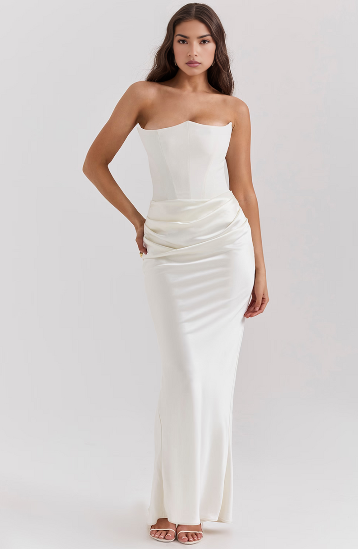 Women's elegant strapless maxi dress with corset detailing, a perfect evening gown.