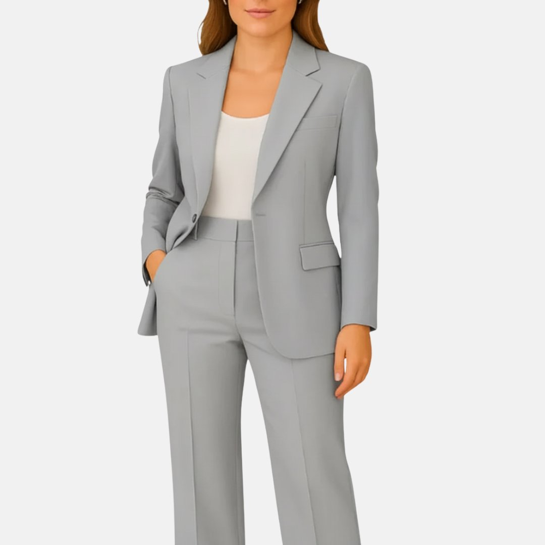 Versatile women's two-piece suit with a tailored blazer and straight-leg pants for sophisticated office fashion.