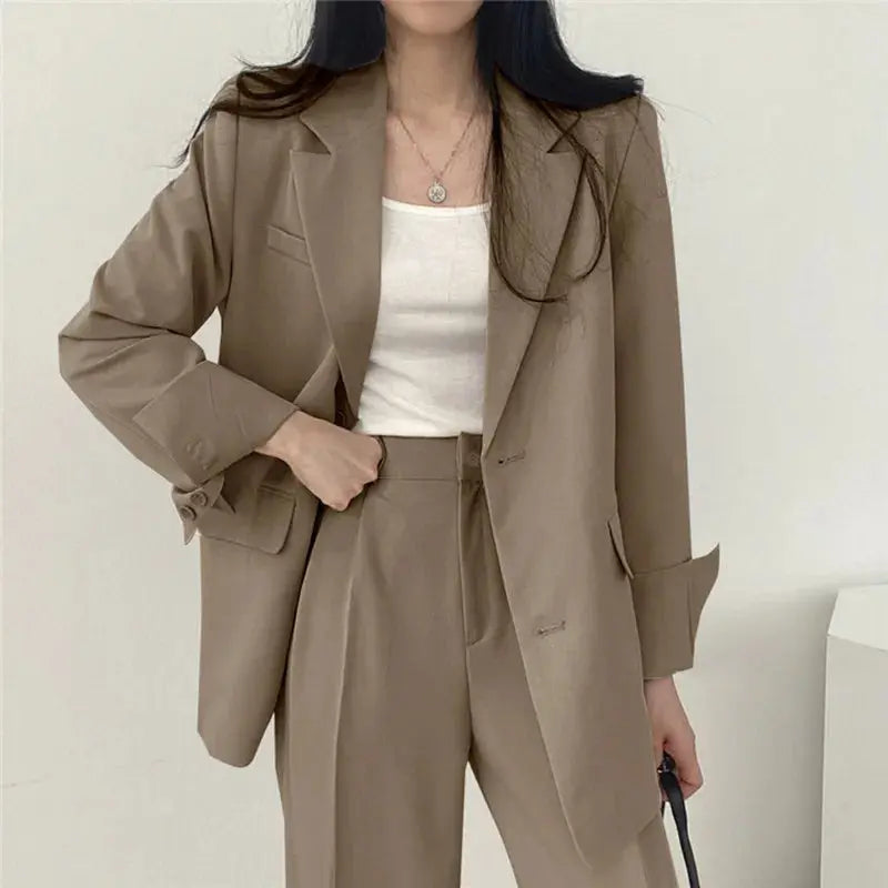 Smart casual women's two-piece suit, featuring a stylish tailored blazer & pants.
