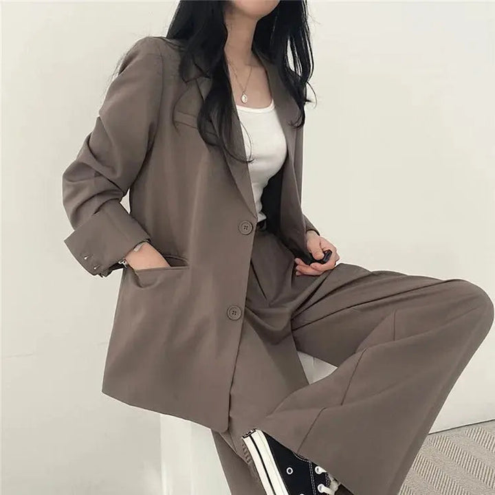Professional women's blazer pants set, designed for comfort & sophisticated style.