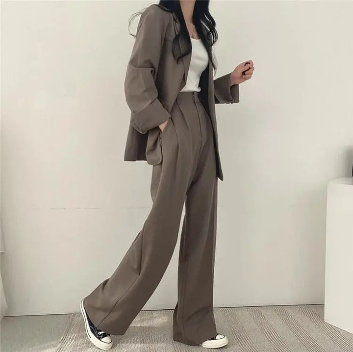Sophisticated women's two-piece set, a blazer & trousers for elegant workwear.
