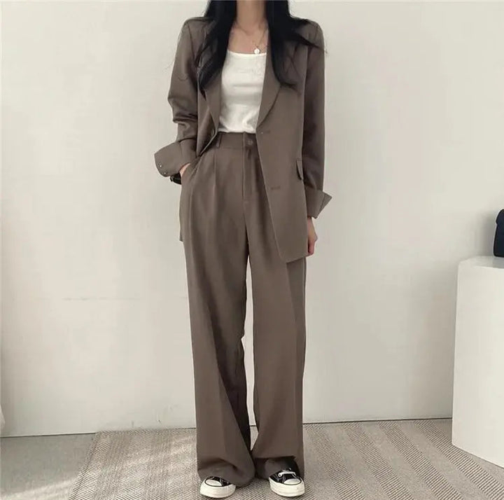 Women's elegant tailored suit, perfect for a powerful and professional silhouette.