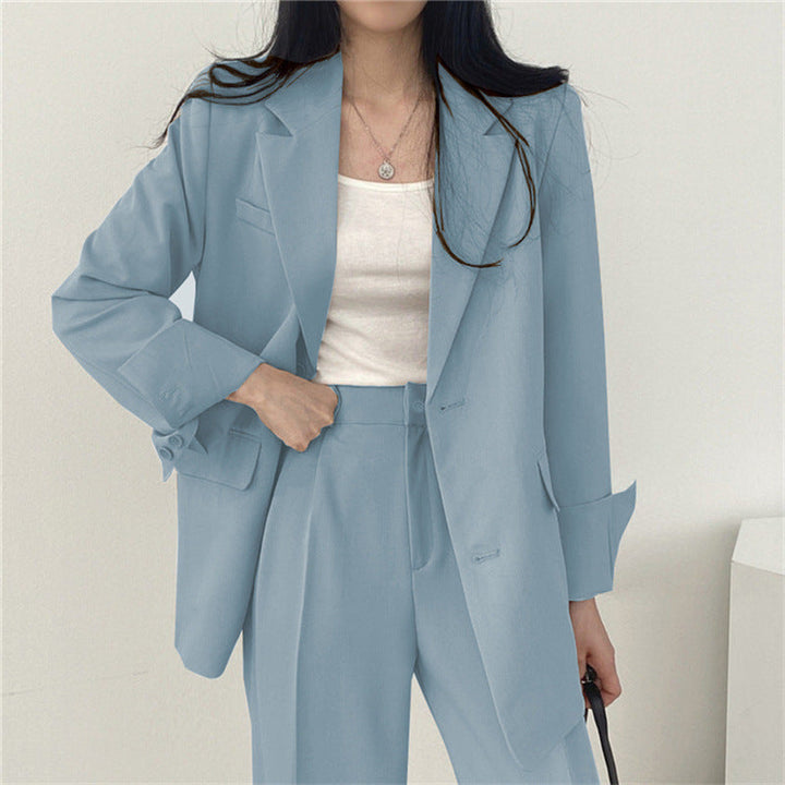 Modern women's office wear, a two-piece blazer and trouser set for sophisticated fashion.