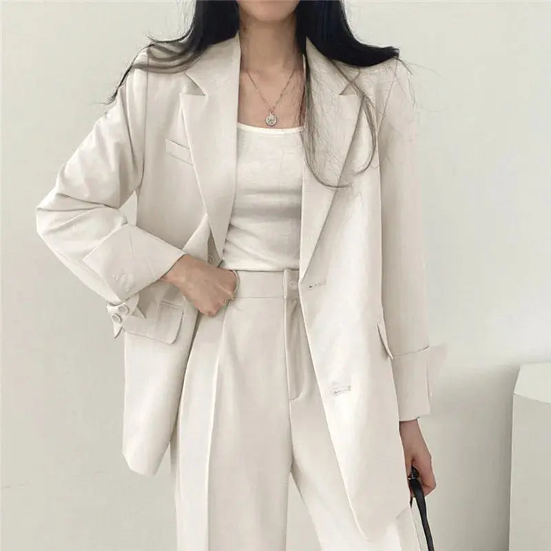 Elegant women's tailored suit for a sharp and modern professional look.